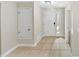 Bright foyer featuring neutral walls and tile flooring at 721 Rock Creek Loop, Longwood, FL 32750