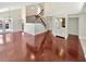 Open living room featuring hardwood floors and staircase at 721 Rock Creek Loop, Longwood, FL 32750