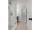 Contemporary bathroom featuring a glass shower, neutral tones, and modern fixtures at 7549 Lake Marsha Dr, Orlando, FL 32819