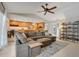 Open concept living space with a kitchen and living room, featuring tile floors at 7549 Lake Marsha Dr, Orlando, FL 32819