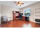 Bright office with hardwood floors, a built-in desk, and plenty of natural light at 7549 Lake Marsha Dr, Orlando, FL 32819