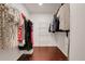 Spacious walk-in closet with ample shelving and hanging space for organized storage of clothing at 7549 Lake Marsha Dr, Orlando, FL 32819
