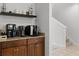 Charming coffee bar area with multiple coffee machines, storage cabinets, and a convenient beverage station at 7739 Graben St, Kissimmee, FL 34747