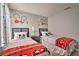 Fun ' bedroom with two twin beds, themed decor, and whimsical touches at 8187 Roseville Rd, Davenport, FL 33896