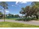 Tennis courts and lush surroundings on a sunny day at 88 E Charlotte Ave, Eustis, FL 32726