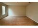 Bedroom with neutral carpet, light-colored walls, and a window at 8933 Hinsdale Heights Dr, Polk City, FL 33868