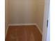 Small walk-in closet with carpeted floor and neutral walls ready for storage and organization at 8933 Hinsdale Heights Dr, Polk City, FL 33868