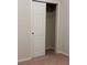 Open closet with a single shelf, providing simple storage at 8933 Hinsdale Heights Dr, Polk City, FL 33868