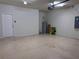A spacious garage with epoxy floors at 8933 Hinsdale Heights Dr, Polk City, FL 33868