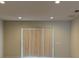 Living Room with sliding glass doors opening to the yard at 8933 Hinsdale Heights Dr, Polk City, FL 33868