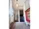 Convenient laundry area with stacked washer and dryer, located just off the main living space at 900 Carlton Ave, Lake Wales, FL 33853