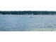 Beautiful water view featuring a fleet of small sailboats enjoying a sunny day on the lake at 900 Carlton Ave, Lake Wales, FL 33853