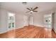 Large bedroom with hardwood floors and ensuite bathroom at 915 Oregon St, Orlando, FL 32803