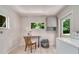 Functional laundry room with washer, dryer, and ample natural light at 915 Oregon St, Orlando, FL 32803