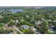 Scenic neighborhood view with a beautiful home featuring a pool, lush greenery, and a peaceful residential setting at 927 Boardman St, Orlando, FL 32804