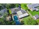 High-angle view displaying the house, pool, yard, and neighborhood, offering a broad sense of the property's setting at 927 Boardman St, Orlando, FL 32804