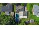 Aerial view of the property highlighting the pool, outdoor seating, and the layout of the backyard and house at 927 Boardman St, Orlando, FL 32804