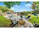 Private backyard features a sparkling pool, fire pit, and patio with seating at 927 Boardman St, Orlando, FL 32804