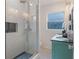 Modern bathroom featuring subway tile shower, dual sinks, and stylish fixtures at 927 Boardman St, Orlando, FL 32804