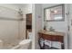 Stylish bathroom featuring tiled shower and granite vanity with storage at 927 Boardman St, Orlando, FL 32804