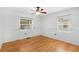 Bedroom with Hardwood floors, ceiling fan, and natural light at 927 Boardman St, Orlando, FL 32804