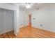 Bedroom with hardwood flooring and a closet, providing essential storage and comfort at 927 Boardman St, Orlando, FL 32804