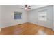 Inviting bedroom with hardwood floors and natural light, offering a warm and comfortable space at 927 Boardman St, Orlando, FL 32804