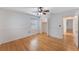 Bright bedroom with hardwood floors, closet, ceiling fan, and natural light at 927 Boardman St, Orlando, FL 32804