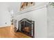 Elegant white brick fireplace with decorative screen and tiled hearth at 927 Boardman St, Orlando, FL 32804