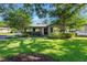 Charming home with mature landscaping and a welcoming front porch at 927 Boardman St, Orlando, FL 32804