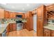 Well-equipped kitchen with stainless steel appliances and hardwood floors at 927 Boardman St, Orlando, FL 32804