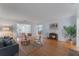 Bright living room with hardwood floors and decorative fireplace at 927 Boardman St, Orlando, FL 32804