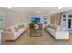 Bright living room featuring two sofas, hardwood floors, and neutral decor, creating a welcoming atmosphere at 927 Boardman St, Orlando, FL 32804