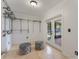 Spacious walk-in closet with track shelving and french doors to patio at 927 Boardman St, Orlando, FL 32804