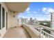 Expansive balcony showcasing beautiful views of the city skyline and greenery at 100 S Eola Dr # 1406, Orlando, FL 32801