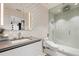 Modern bathroom featuring a sleek vanity, stylish mirror, and luxurious glass-enclosed shower with premium fixtures at 100 S Eola Dr # 1406, Orlando, FL 32801