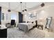 Bright bedroom with a desk, sleek furnishings, and modern decor, creating a comfortable and stylish living space at 100 S Eola Dr # 1406, Orlando, FL 32801