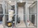 Secured storage unit with metal mesh doors, offering ample space for belongings at 100 S Eola Dr # 1406, Orlando, FL 32801