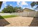 Backyard featuring a brick patio and privacy fence at 10111 Tierra Bella Dr, Orlando, FL 32825