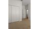 Bedroom with large closets and neutral carpet at 10111 Tierra Bella Dr, Orlando, FL 32825