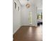 Bright foyer with tile flooring and transom window over door creating an inviting ambiance at 10111 Tierra Bella Dr, Orlando, FL 32825