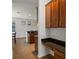 Kitchen/dining area with rich cabinets, and black countertops at 10111 Tierra Bella Dr, Orlando, FL 32825