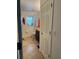Bathroom with a toilet, sink, and window offering natural light, providing a functional space at 10148 Malpas Pt, Orlando, FL 32832