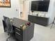 Well-lit office space with a large desk, comfortable chair, and storage cabinets, ideal for a productive work environment at 10148 Malpas Pt, Orlando, FL 32832