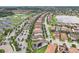 Aerial of community with large community center, playground and pristine landscaping at 10203 Henbury St, Orlando, FL 32832