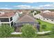 Aerial view of fenced backyard with screened lanai at 10203 Henbury St, Orlando, FL 32832