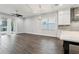 A spacious living space with hardwood floors and recessed lighting, perfect for entertaining at 10203 Henbury St, Orlando, FL 32832