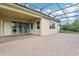 This property includes an outdoor patio with both covered and screened in areas for entertaining or enjoying the fresh air at 10203 Henbury St, Orlando, FL 32832