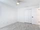 Bright bedroom featuring tile floors, a ceiling fan, and a large closet at 1113 Leeward Dr, Deltona, FL 32738