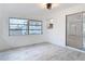 Bright room features tile floors, windows and view into kitchen at 1113 Leeward Dr, Deltona, FL 32738